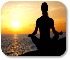 Photograph of girl practicing yoga at sunset